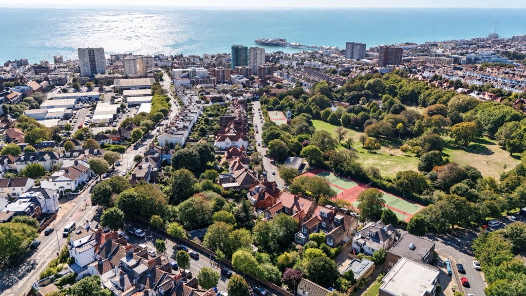 Aerial view across Queen’s Park and central Brighton towards the seafront and Brighton Palace Pier
